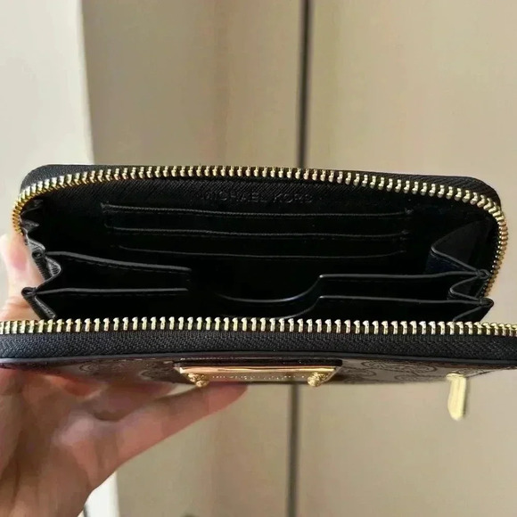 Michael Kors Black Wristlet with Gold Accents - Picture 2 of 14